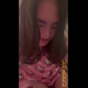 Emi twerks over a toilet in pajamas, then sits down facing the camera to push out mucusy pebbles. She wipes her ass and shows the dirty toilet paper. Vertical format video. Over 1.5 minutes.